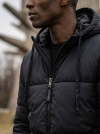 Recycelte Pufferjacke mit Kapuze